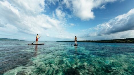two-people-stand-up-paddle-boarding-in-vanuatu